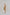 模特兒穿著罌粟黃格紋雙拉鍊口袋洋裝，展現前胸拉鍊細節與純棉面料的蓬鬆垂墜感。