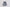 模特兒穿著三層雙拉鏈蕾絲洋裝「卡其格紋」，卡其色格紋布與日本蕾絲層層拼接，搭配前胸雙拉鍊與兩側口袋設計，呈現溫潤又俐落的廓形。